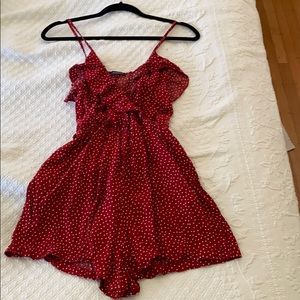 Polka dot red and white romper from brandy